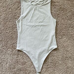 Vitality White Bodysuit Top